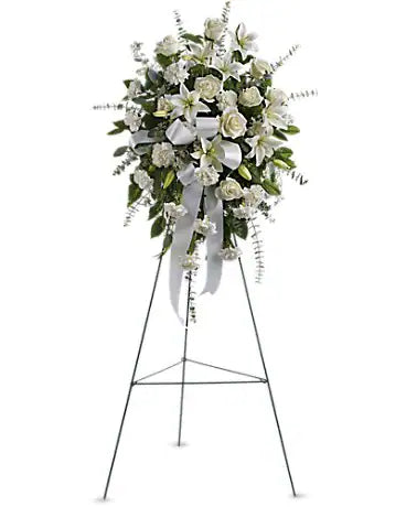 Sentiments of Serenity standing spray, white roses and lilies on easel