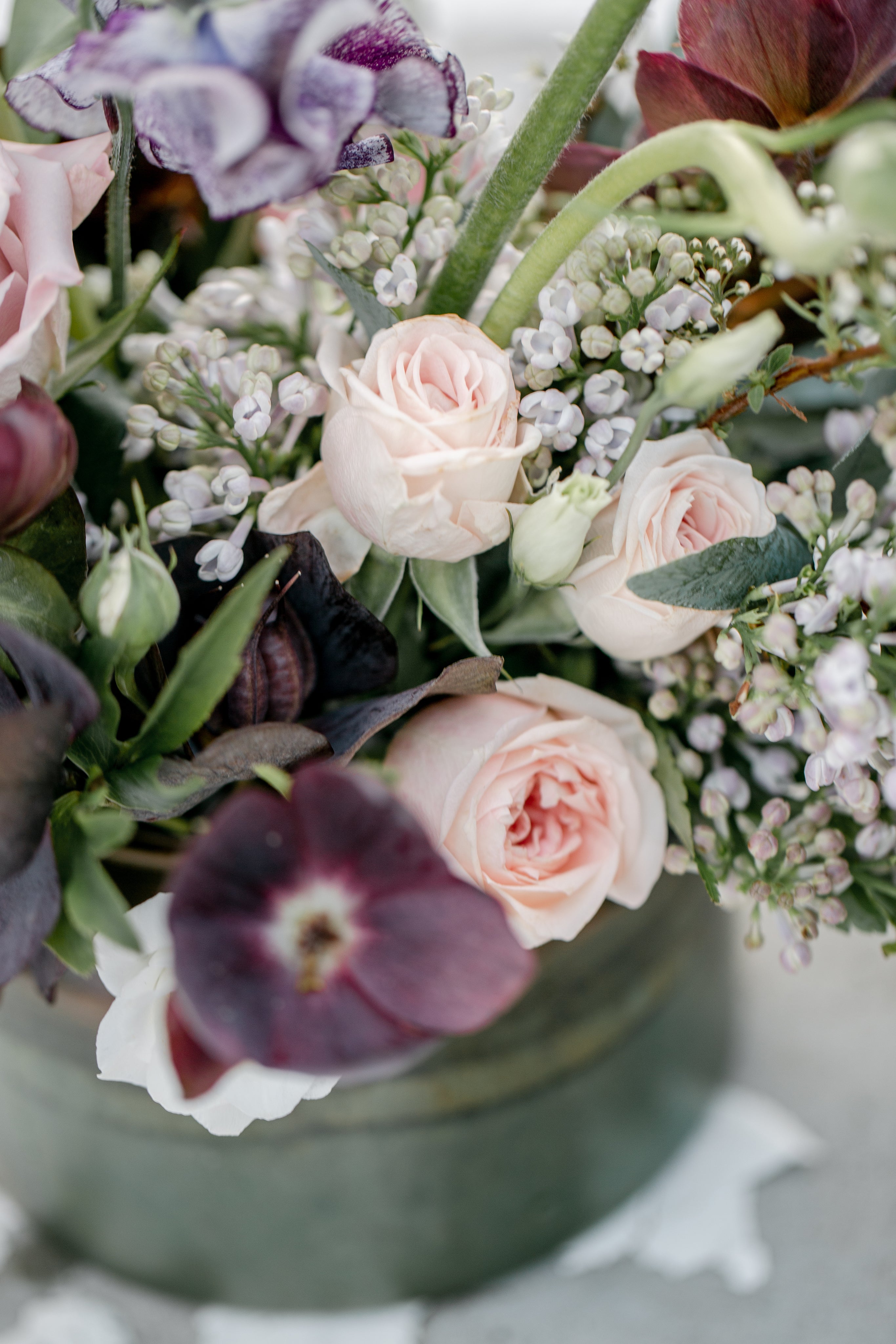 Close-up of pink and purple wedding bouquet, Olson's Flowers Mount Horeb